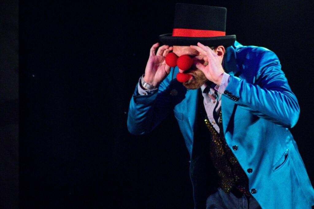 The great armando has a sponge ball in his mouth and two covering his eyes